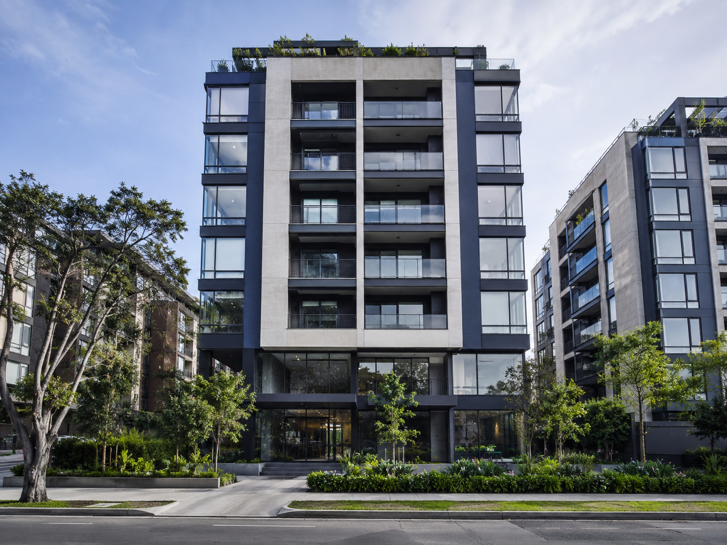 TwinTown building — verified facade with garden